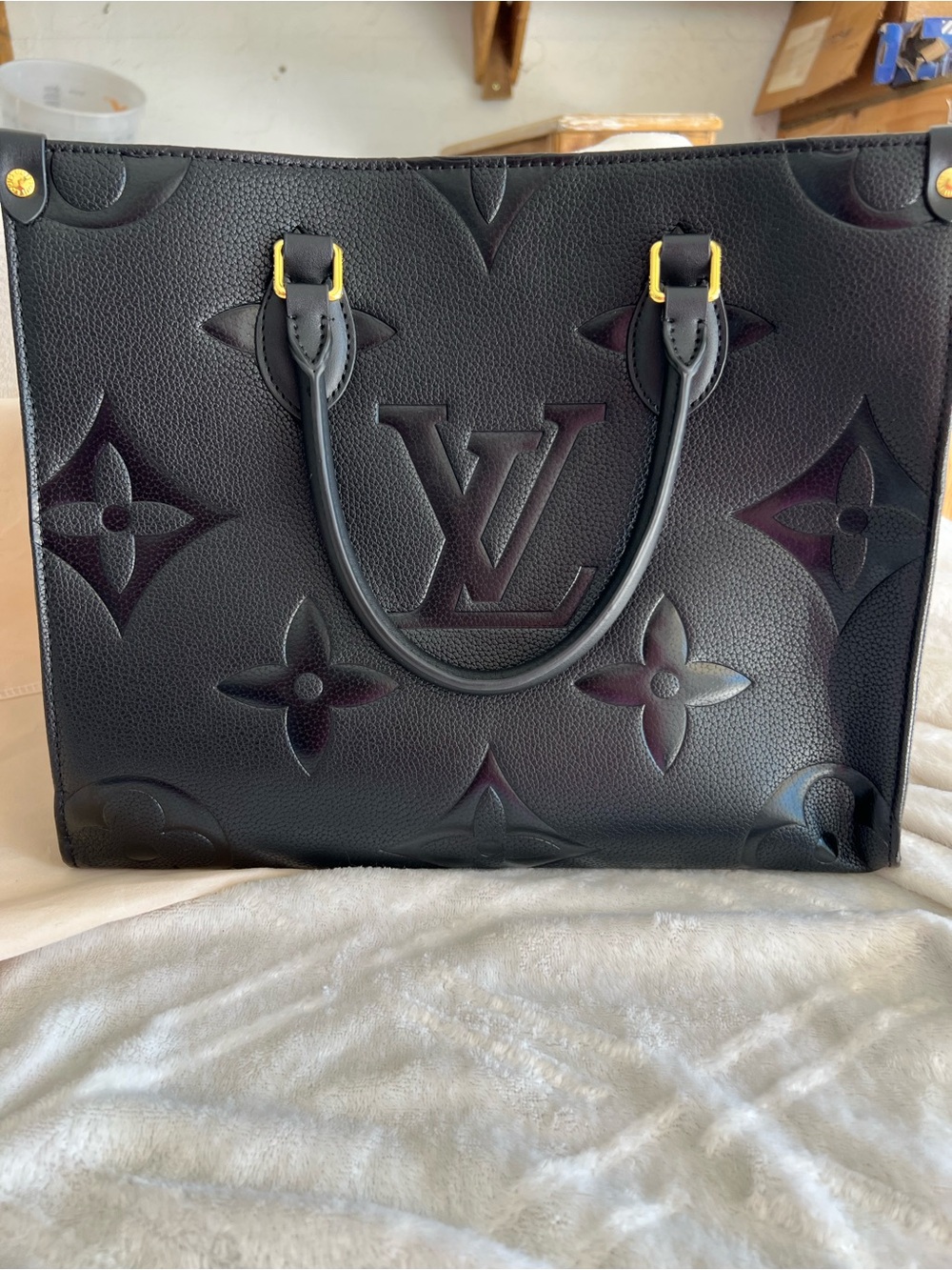 Louis Vuitton Black Embossed Monogram OnTheGo Tote with Gold-Tone Accents